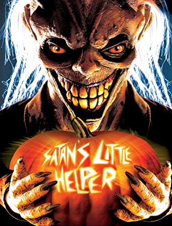 Image: A grinning demonic figure holds a jack-o'-lantern with the words "SATAN'S LITTLE HELPER" carved into it.